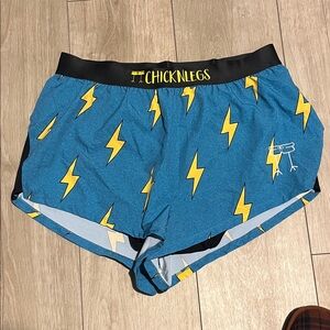 2 inch blue lightning chicknlegs shorts. Gently used, too big for me.